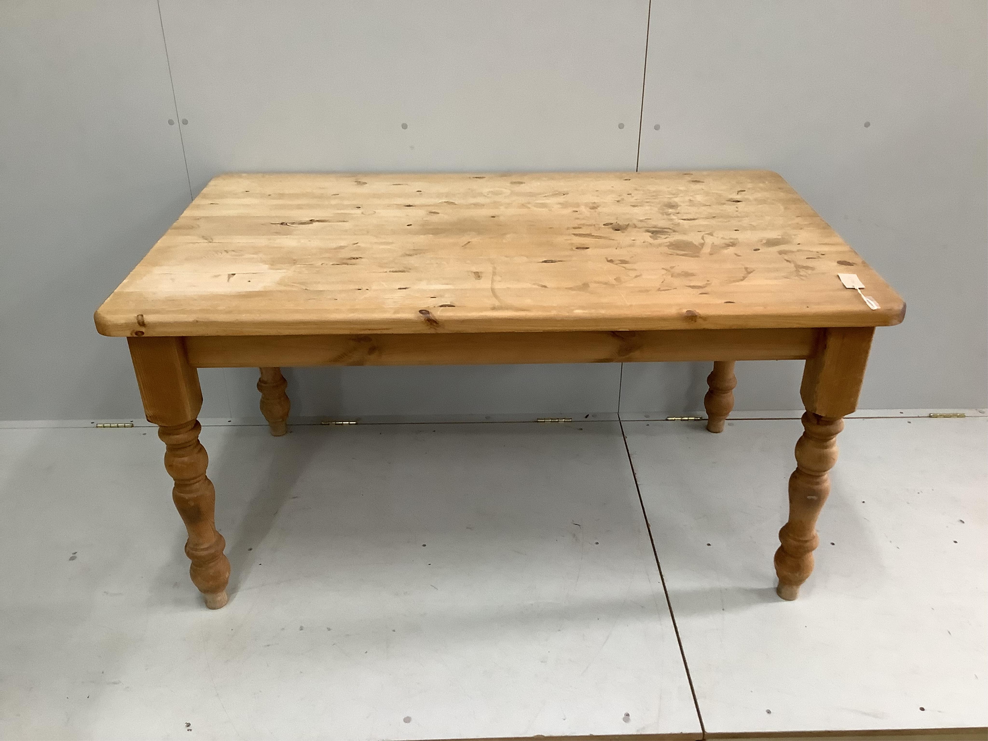 A Victorian style rectangular pine kitchen table, width 150cm, depth 90cm, height 77cm. Condition - fair